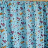 Cotton Curtain Animal Print 58 Inch Wide Puppies Chase Ball and Bone Blue