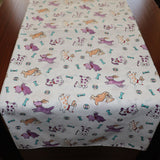 Cotton Print Table Runner Animal Print Puppies Chasing Ball and Bone Purple on White
